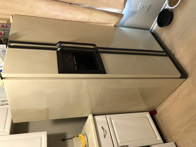 Kenmore side-by-side refrigerator in a kitchen