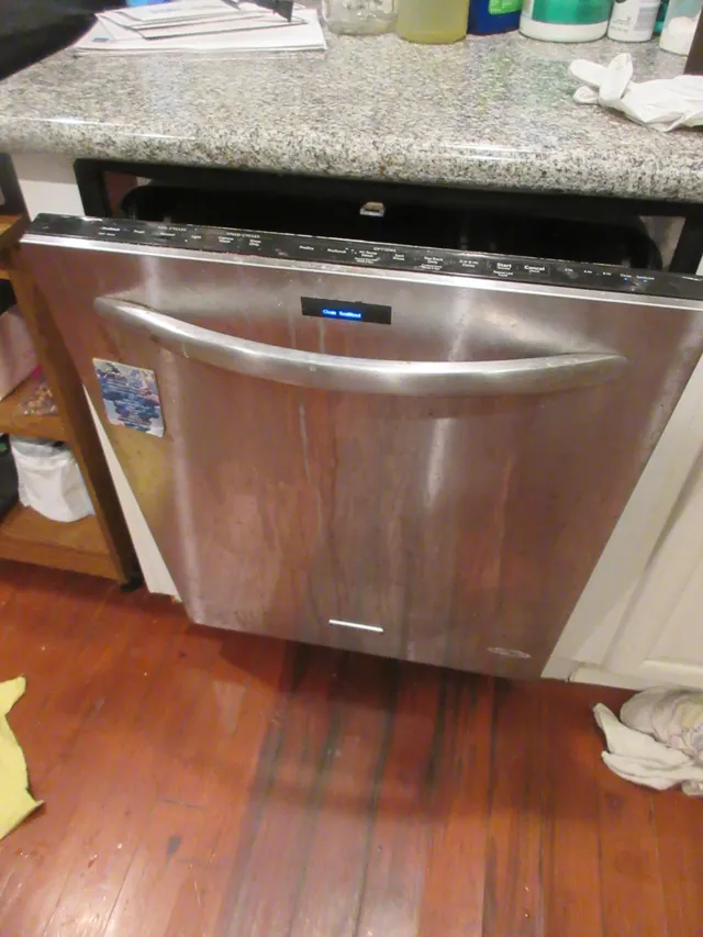 KitchenAid stainless dishwasher in a home kitchen