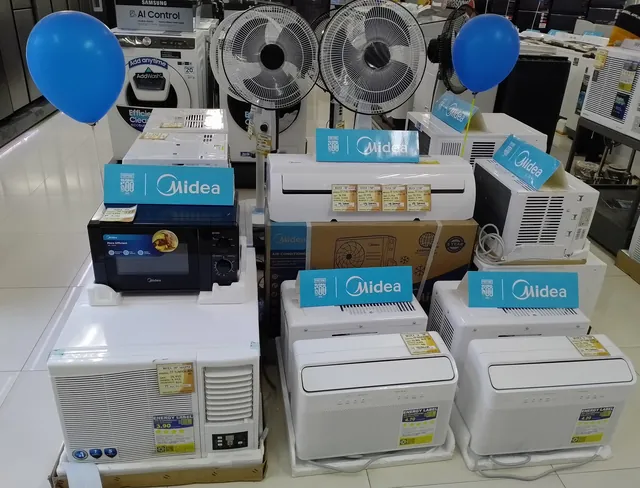 Midea appliances on display in a store