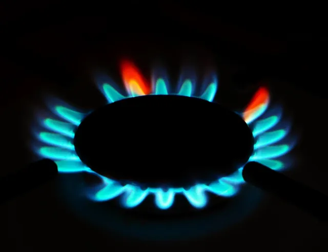 Blue flame from a gas stove burner