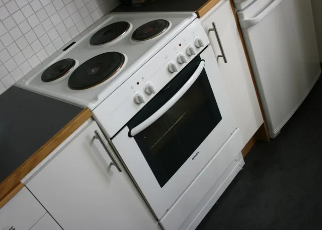 Electric range with oven in a home kitchen